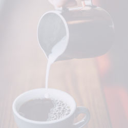 Pouring cream into cup