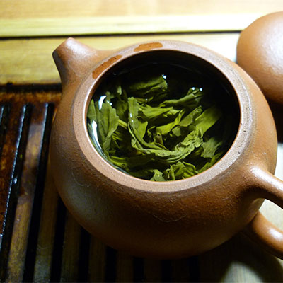Tea steeping in traditional kettle